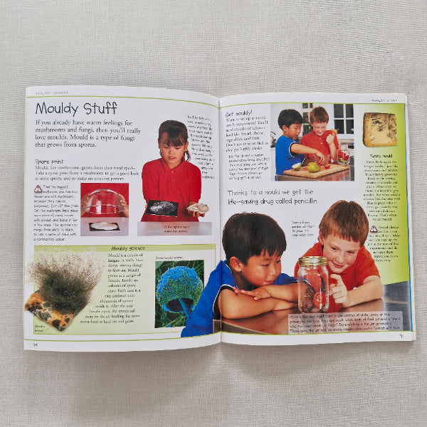 Open book with images of children and text on a light gray background