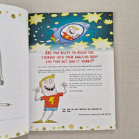 Open book with cartoon illustrations and text on a textured surface