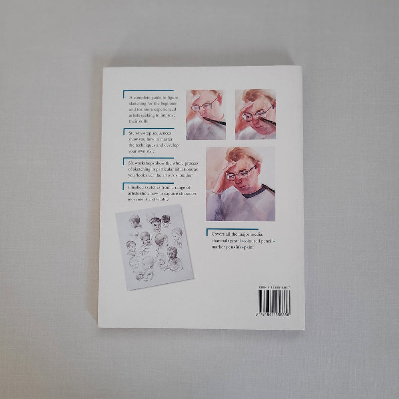 Book cover with face illustrations and text on a gray background