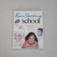 Book titled 'Figure Sketching School' on a plain background