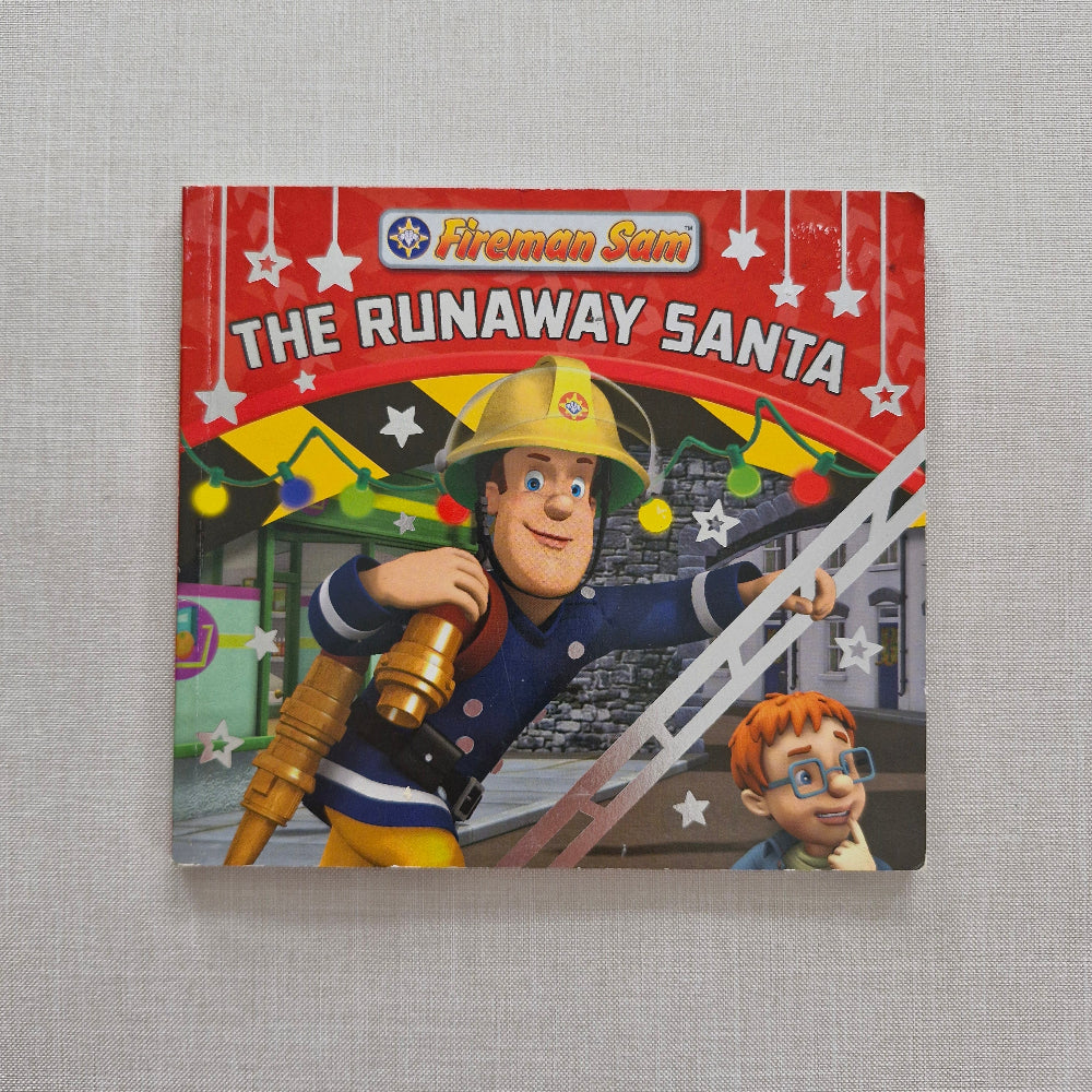 Children's book titled 'The Runaway Santa' featuring a firefighter character on a grey background