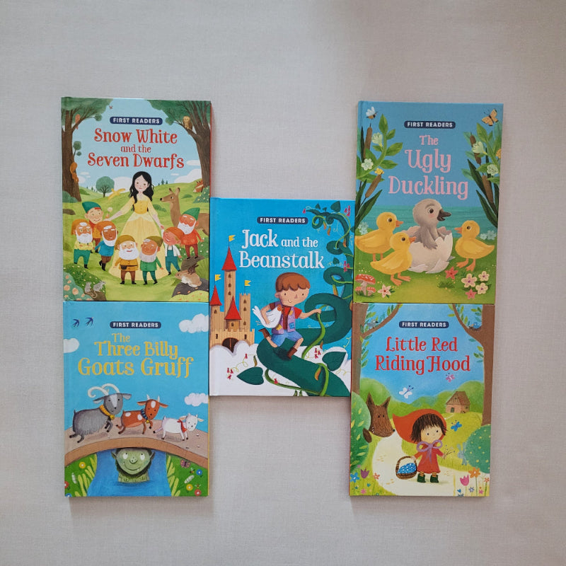 Collection of children's books with colourful covers on a light gray background