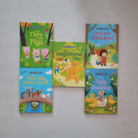 Set of children's books with colourful covers on a gray background