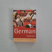 Dictionary phrasebook titled 'German' on a gray background