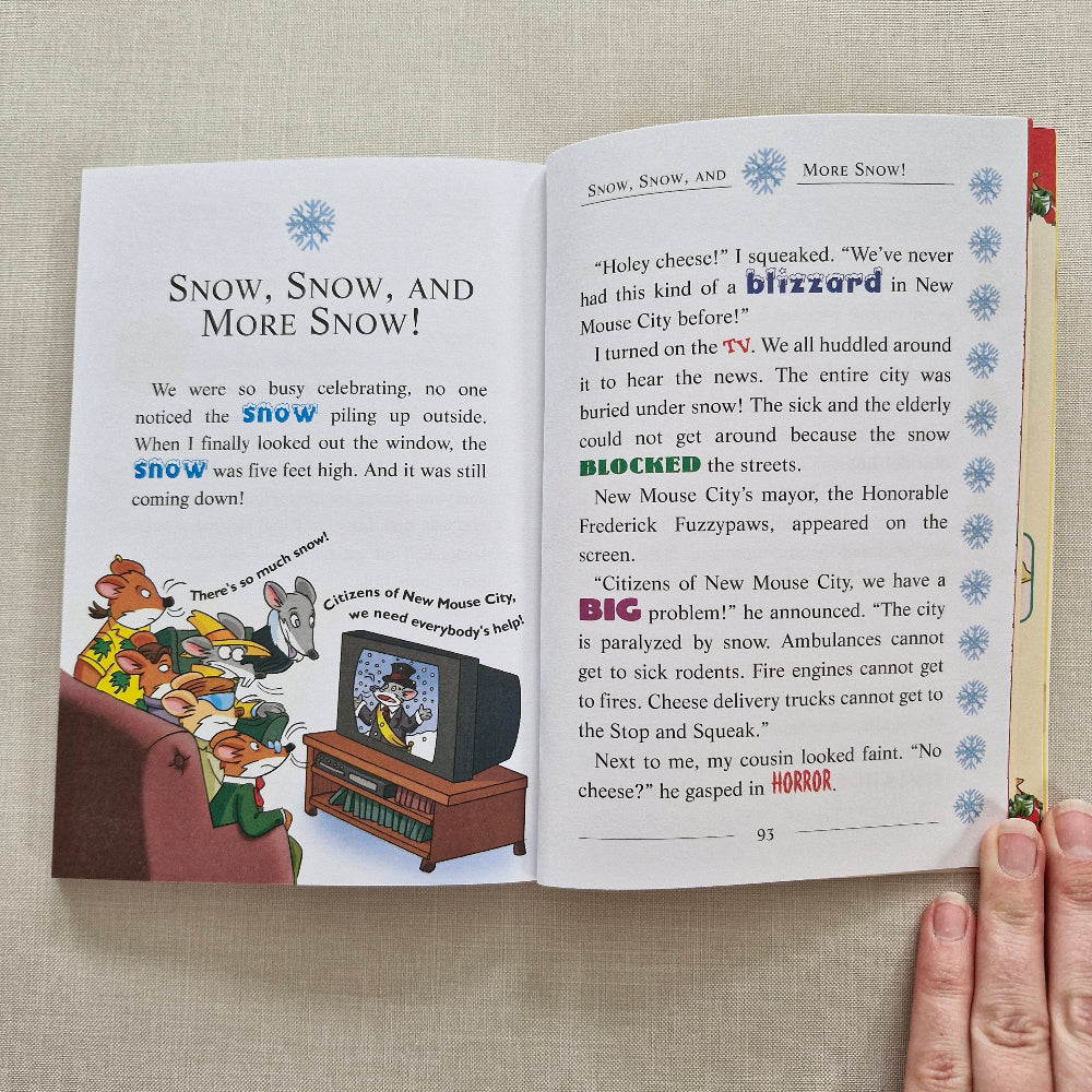 Open book with cartoon illustration on a textured surface