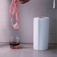 Roll of normal paper towels, showing less absorbency than bamboo towels