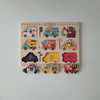 Wooden puzzle with colorful vehicle illustrations on a white background