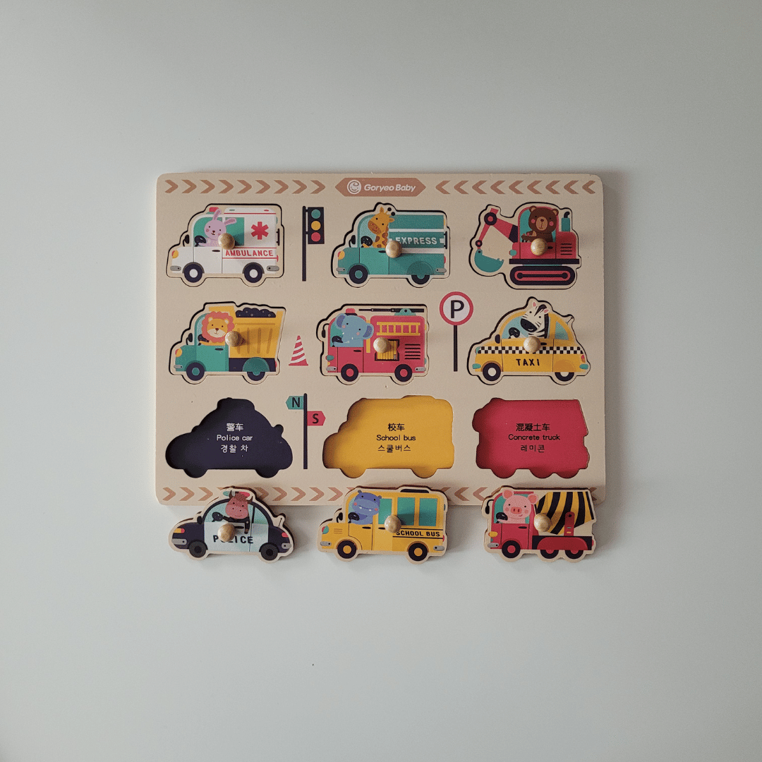 Wooden puzzle with colorful vehicle illustrations on a white background