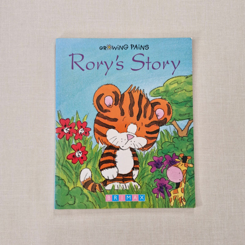 Children's book titled 'Rory's Story' with a tiger character on the cover, placed on a textured surface.