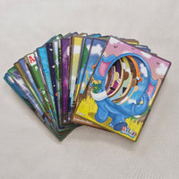Stack of colorful guessing cards on a light gray background