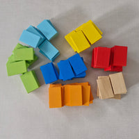Colourful wooden blocks on a grey surface