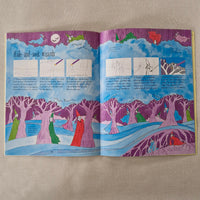 Open book with colourful illustrations on a textured surface