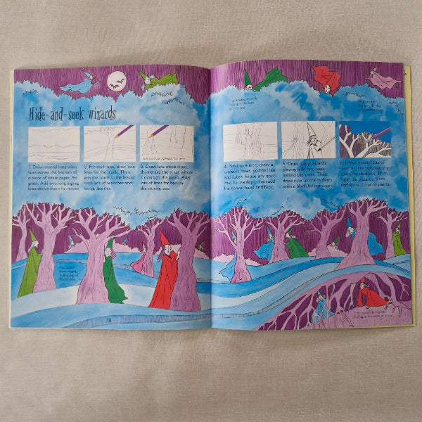Open book with colourful illustrations on a textured surface