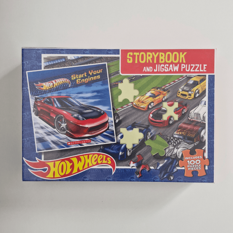 Hot Wheels jigsaw puzzle set on a grey background
