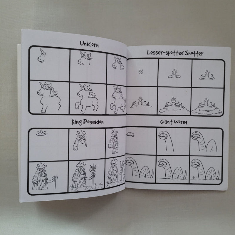 Open book with illustrations of various creatures on a plain background