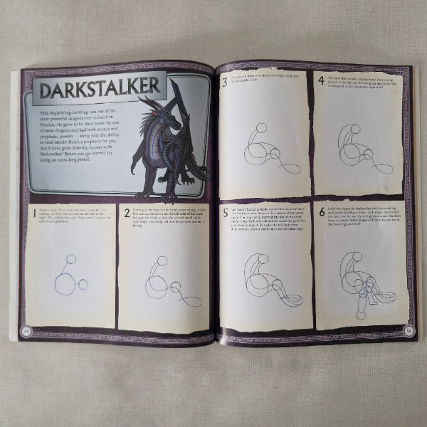 Open book with illustrations and text on a textured surface