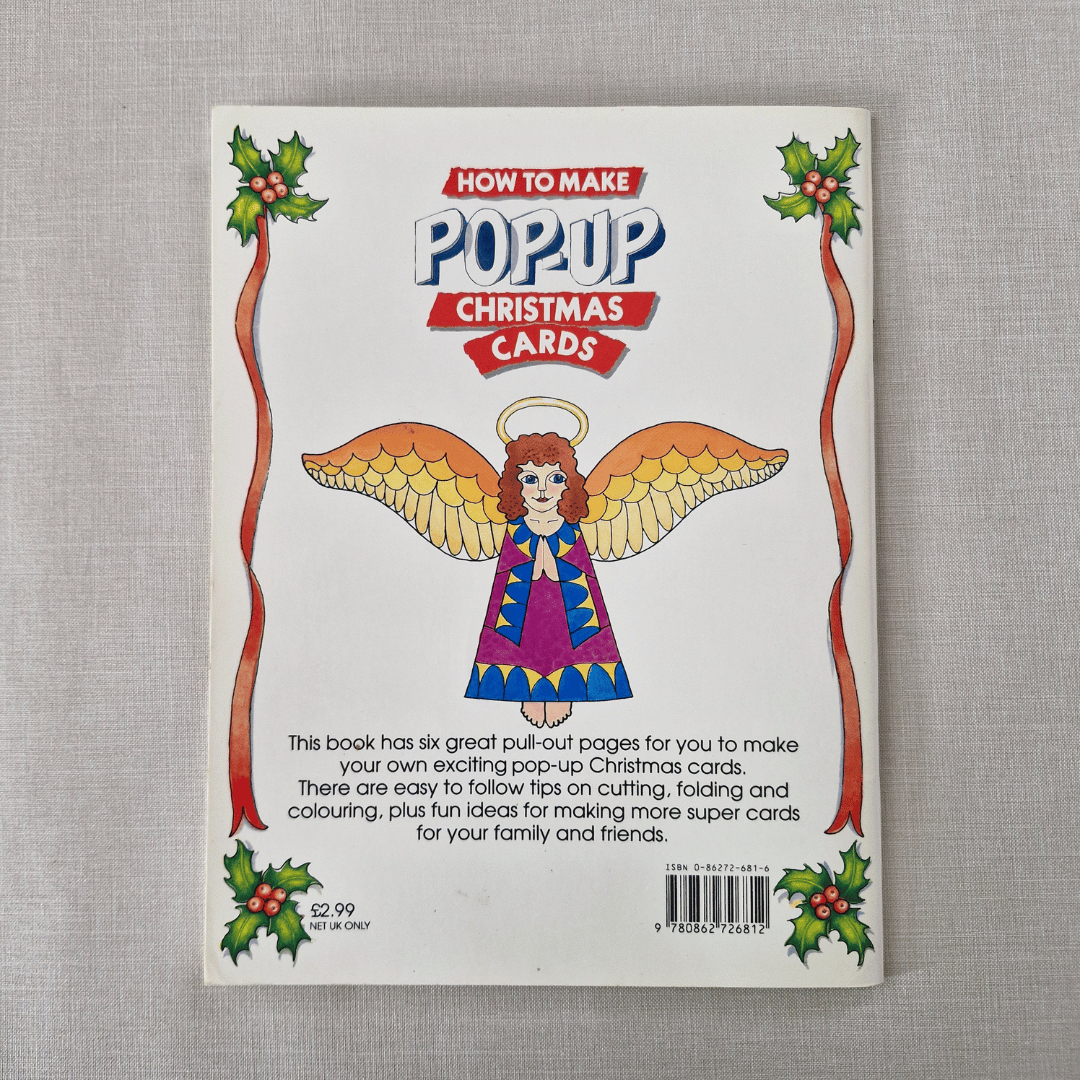 Book back cover for 'How to Make Pop-Up Christmas Cards' with an angel illustration on a grey background