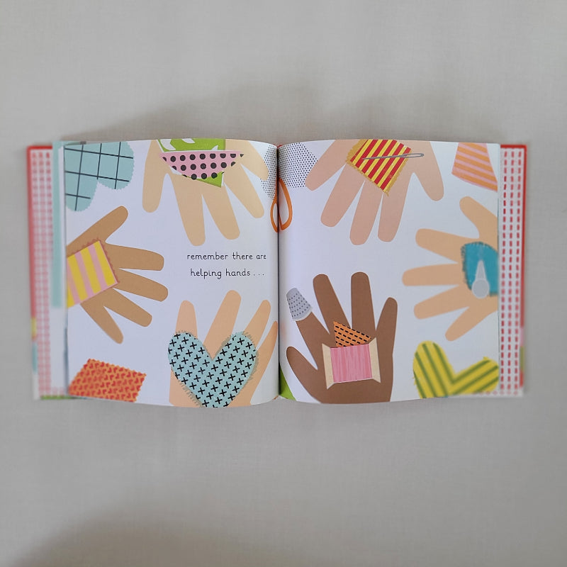 Open book page with a circle of hands all holding small pieces of material fabric