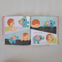 Open page with 4 children showing frustration on their faces as attempted to sew a patch on an elephant