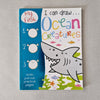 Book cover of 'I can draw Ocean Creatures' with a shark illustration on a grey background