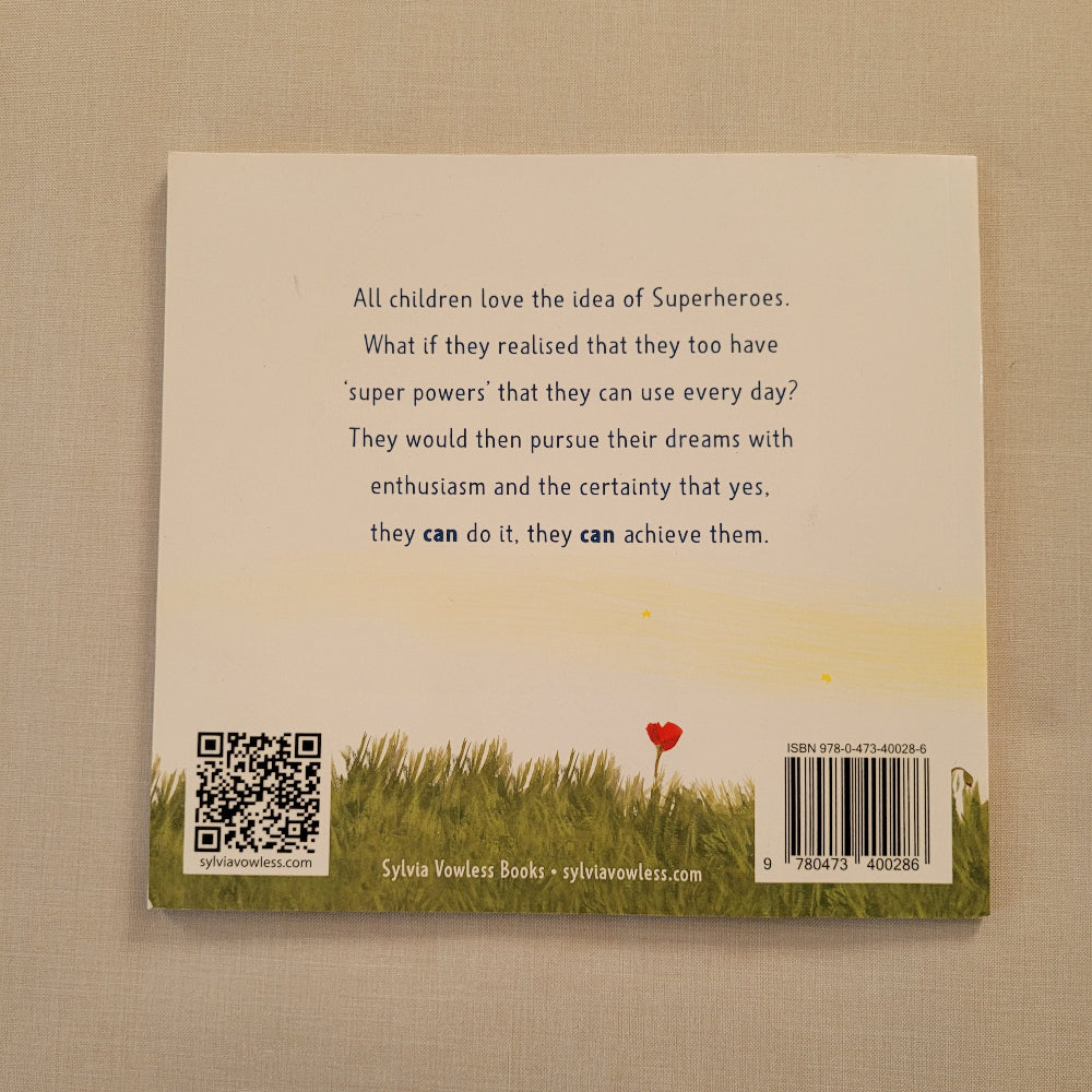 The back cover of a children's book titled 'They Can Achieve Them' by Silver Waters Books, displayed flat on a beige fabric background. The cover features a cream-colored background with black text, a yellow and green landscape illustration at the bottom, and a small red heart.