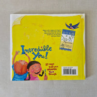 Back cover of a children's book with a yellow background and illustrations of children playing.