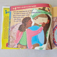 Illustrated book page with two children and text on a gray background
