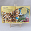 Open book on a stand with illustrations of bees and honeycomb, on a grey background