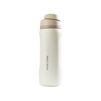 Cream water bottle with pink cap on a white background