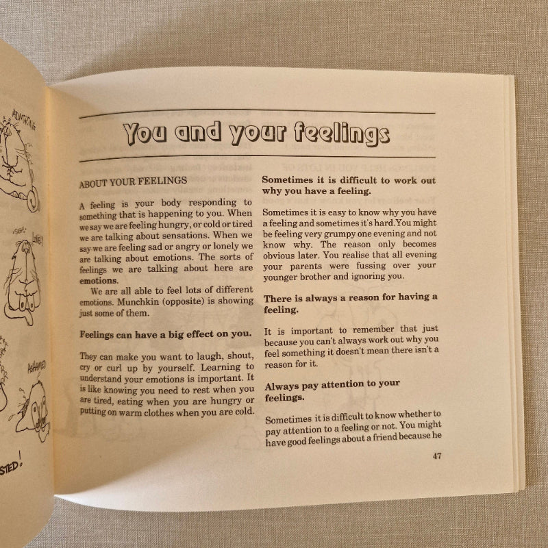 Open book with text on a textured surface