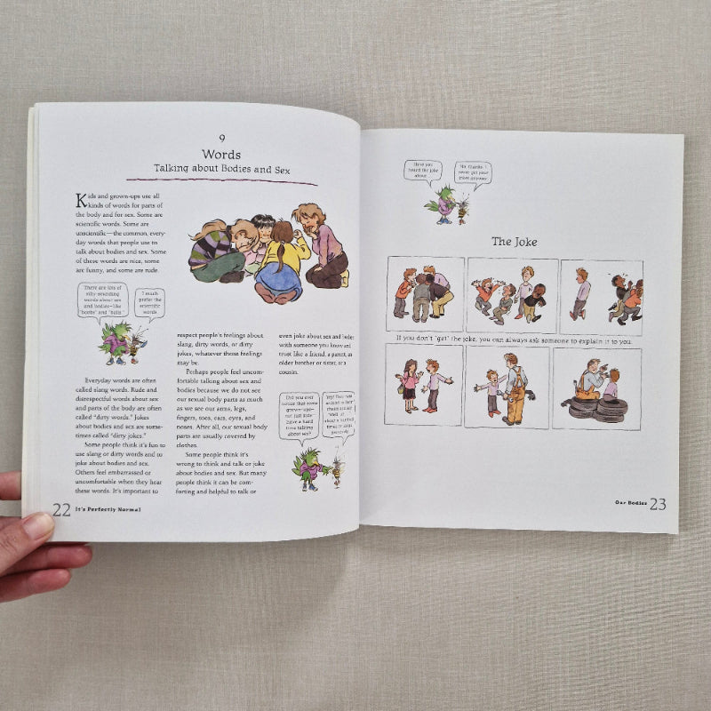 Open book with illustrations and text on a beige fabric background