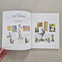 Open book with illustrations and text our bodies
