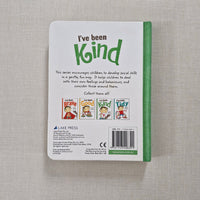 Back cover of a children's book titled 'I've been Kind' on a textured gray surface.