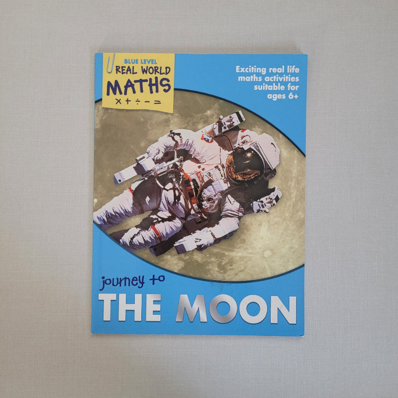 Book cover of 'Journey to the Moon' with an astronaut on a gray background
