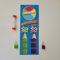Pictionary Junior game set with colourful components on a white background