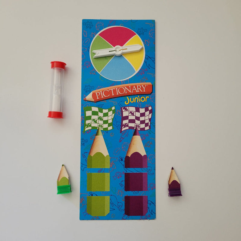 Pictionary Junior game set with colourful components on a white background
