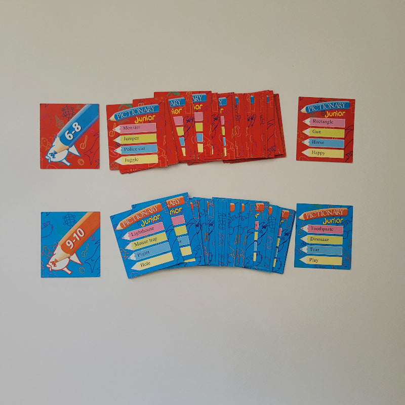Colourful educational cards on a plain background