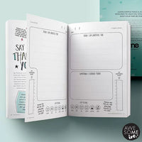 Open notebook with self-help pages on a light blue background