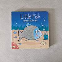 Children's book titled 'Little Fish goes exploring' with a fish illustration on a beige background
