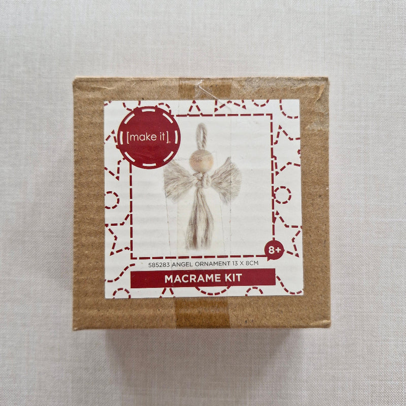 Macrame kit packaging with a decorative label on a light grey background