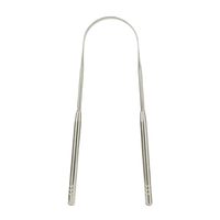 Metal tongue scraper on a white background