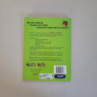 Green book back cover with text and a barcode on a light gray background