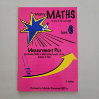 Pink book titled 'Mighty Maths'  book 6with colourful graphics on a gray background