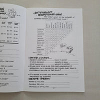 Open book with text and maths illustrations on a textured surface