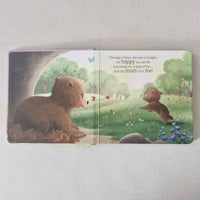 Children's book with bear illustrations on a light gray background