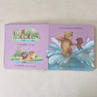 Children's book with bear illustrations on a light gray background