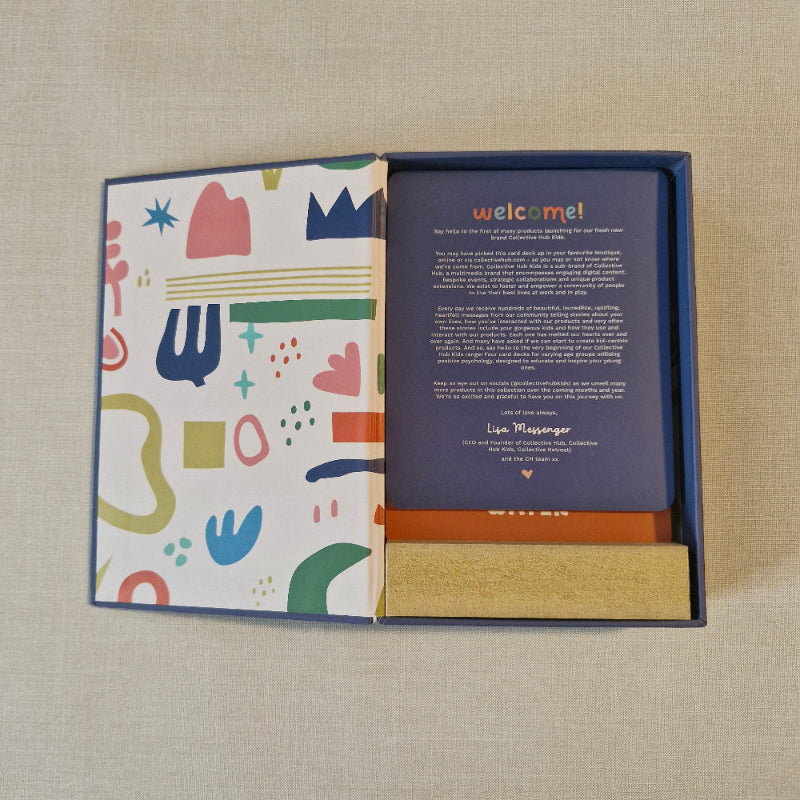 Open box with a colourful patterned interior on a beige background