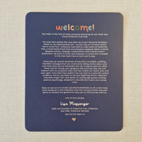 Navy blue card with colorful text on a textured beige background