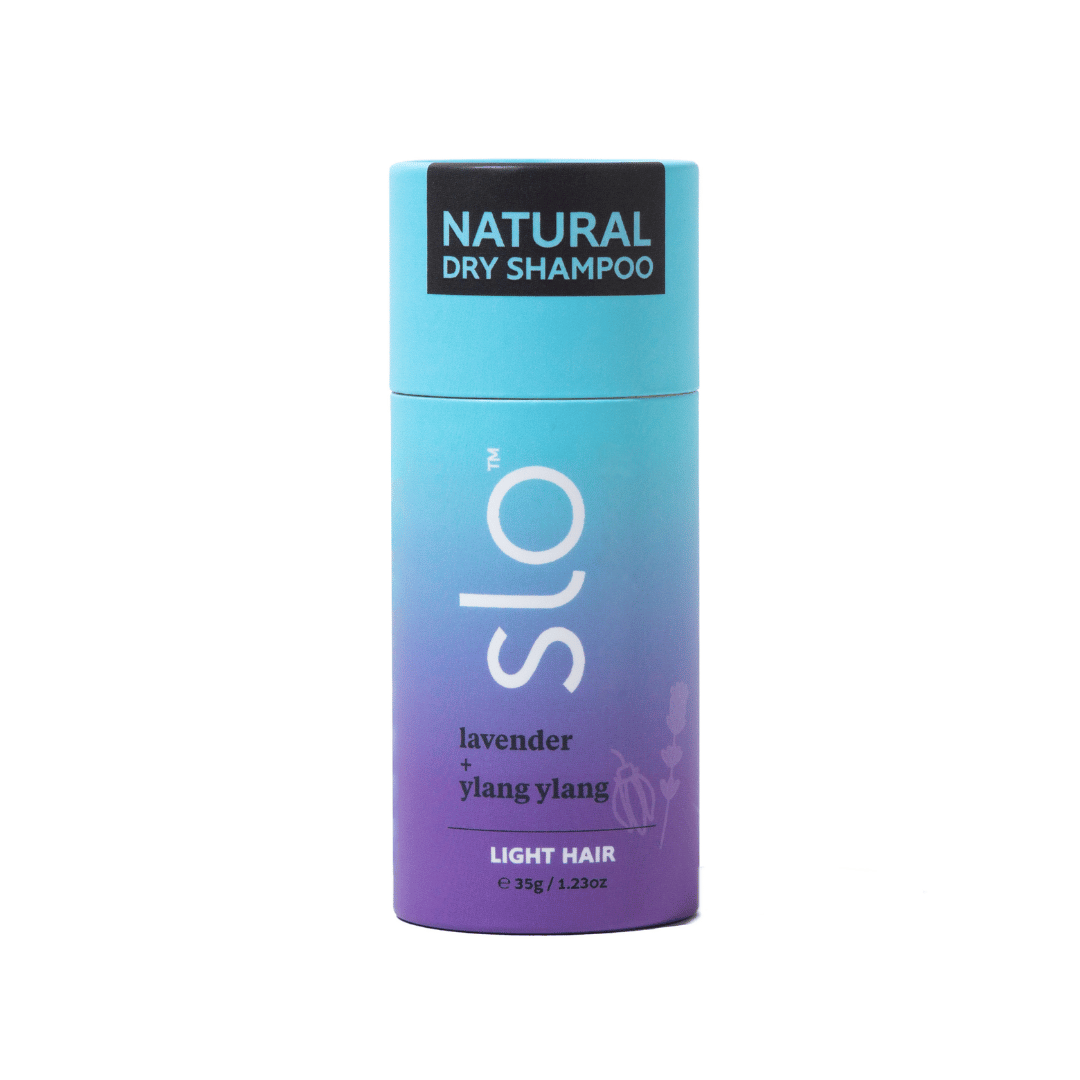 SLO natural dry shampoo bottle with gradient blue to purple design on a white background