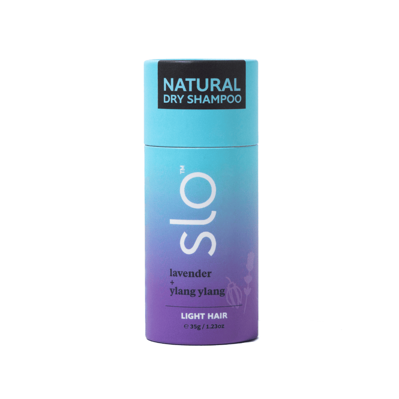 SLO natural dry shampoo bottle with gradient blue to purple design on a white background